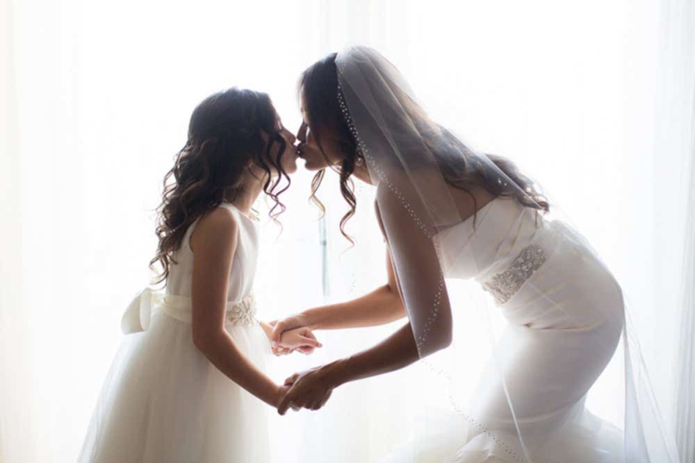candid-wedding-photography bride and daughter wedding photo